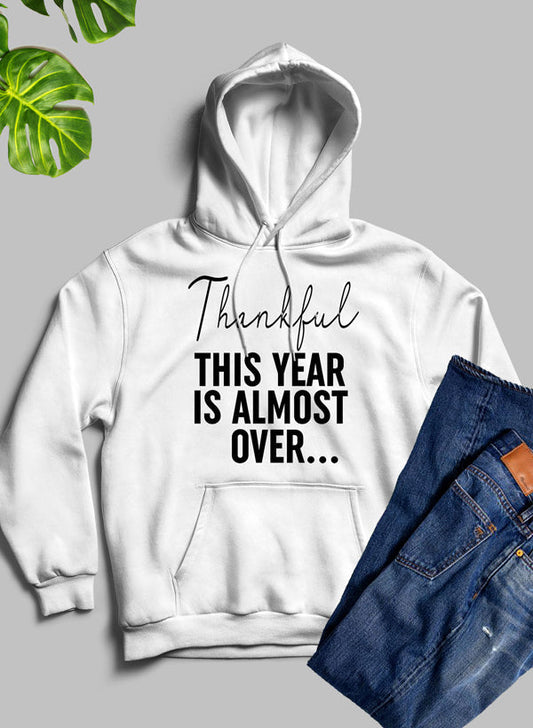 Thankful This Year Is Almost Over Hoodie – Cozy Comfort with a Dash of Sarcasm