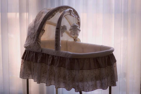 How to get newborn to sleep in bassinet
