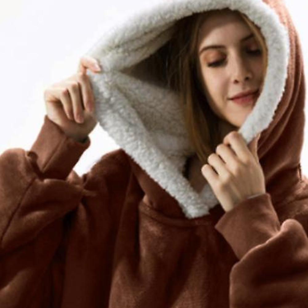 child wearing a red hooded blanket