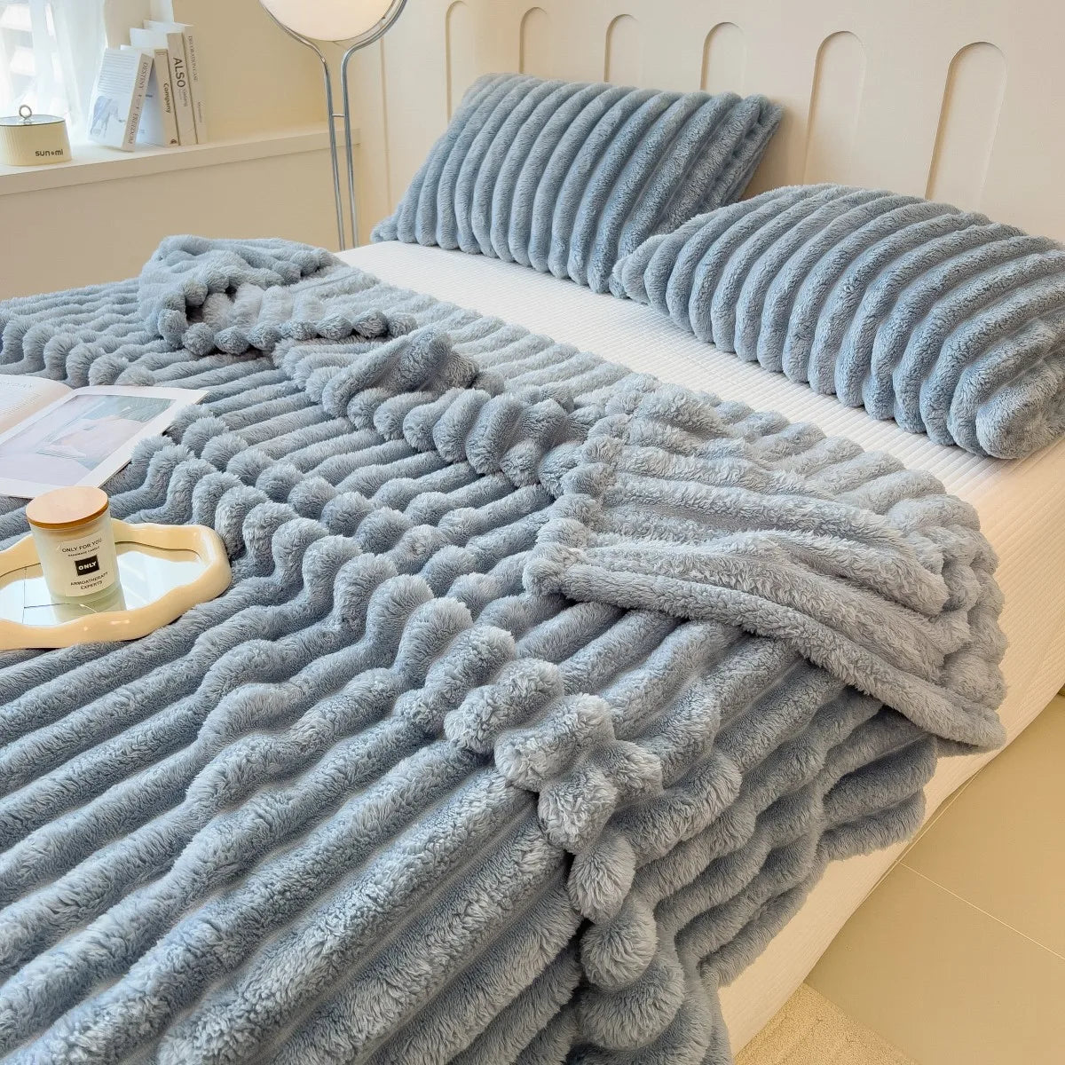Solid color thickened wide striped multifunctional blanket